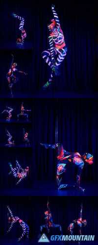 Female Pole Dancer in Bright Neon Colours Under Ultraviolet Light
