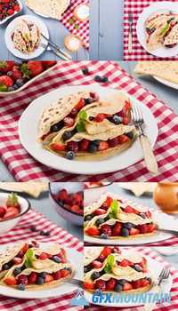 Delicious Pancakes with Raspberries, Blueberries and Strawberrie