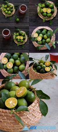 Green Kumquat Fruit on Wooden Background