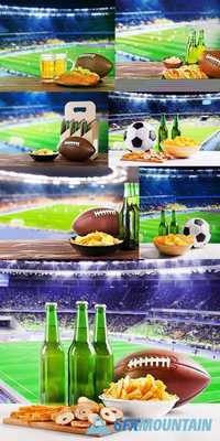 Beer with Snack and Ball on Table Against Football Field