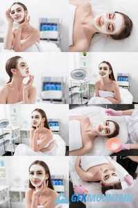 Attractive Young Woman is Enjoying Facial Treatment