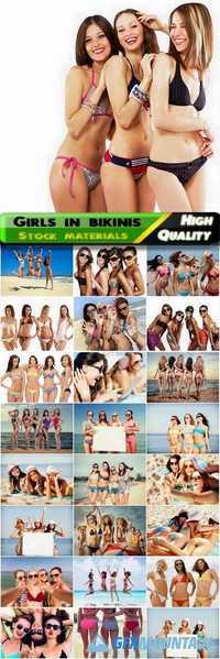 Group of girls and woman in bikinis on the sunny beach, holiday vacation Stock images