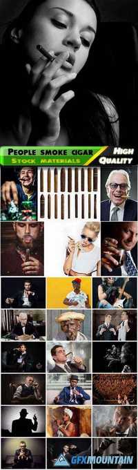 Man and woman smoke cigars and cigarillos, hipsters, businessmen, smoke, Smoking is social issues Stock images