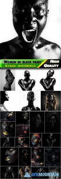 Beautiful woman and girls in black paint Stock images