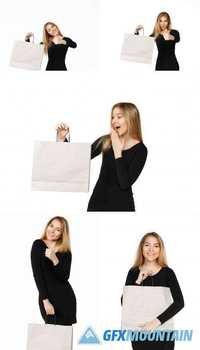 Young Woman in a Black Dress with Shopping Bags, Isolated on a White Background