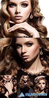 Beautiful Woman with Long Curly Hair and Gold Jewelry