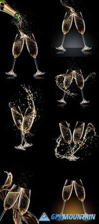 Two Glasses of Champagne Over Black Background