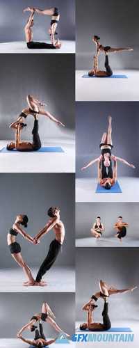 Young Couple Practicing Acro Yoga