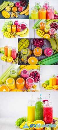 Multicolored Smoothies in Bottles of Mango, Orange, Banana, Celery, Berries