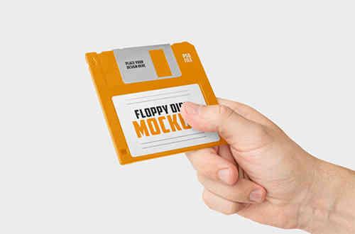 Hand Holding Floppy Disk Mockup